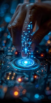 Persons hand pressing a button on a circuit board photo
