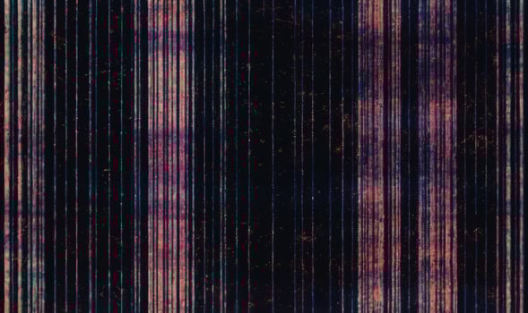 VHS effect blankets the composition mimicking white noise over a grunge film texture photo
