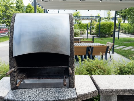 Outdoor BBQ grill. Barbecue open fireplace for cooking photo