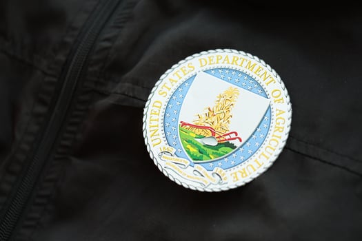 KYIV, UKRAINE - MARCH 9, 2024 US Department of Agriculture seal on black jacket uniform photo