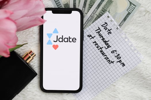 KYIV, UKRAINE - FEBRUARY 23, 2024 Jdate logo of famous dating website or app on iPhone display photo