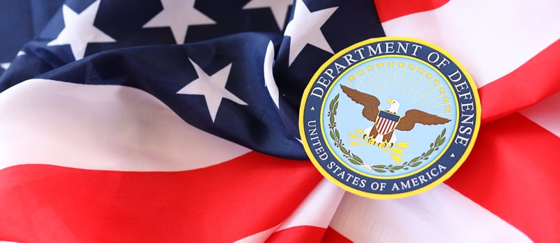 KYIV, UKRAINE - MARCH 9, 2024 US Department of Defense seal on United States of America flag photo