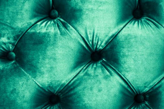 Emerald luxury velour quilted sofa upholstery with buttons, elegant green home decor texture and background photo