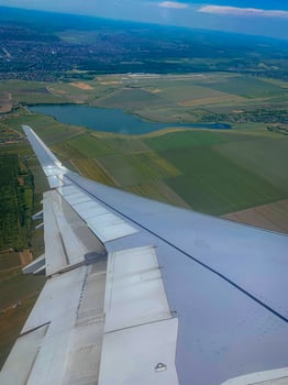 Airplane wing view from the window photo