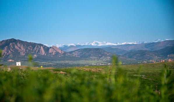 The Flatiron mountains and blue sky at night in summer. photo