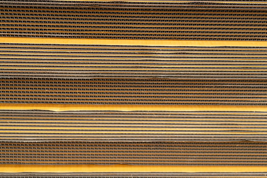 Cardboard, texture, background for graphics It is factory made cardboard waiting to be packed. photo