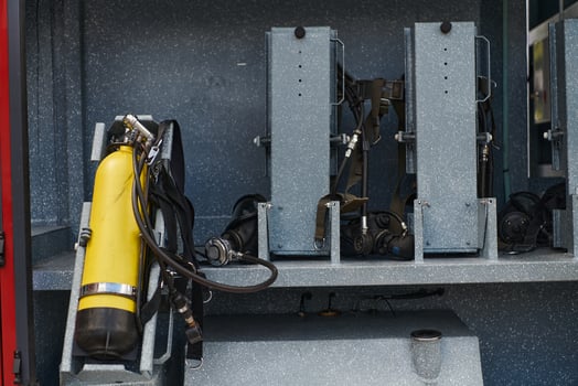 Close-up of essential firefighting equipment on a modern firetruck, showcasing tools and gear ready for emergency response to hazardous fire situations photo