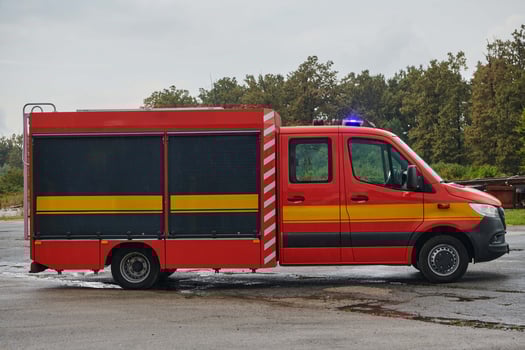 A state-of-the-art firetruck, equipped with advanced rescue technology, stands ready with its skilled firefighting team, prepared to intervene and respond rapidly to emergencies, ensuring the safety photo