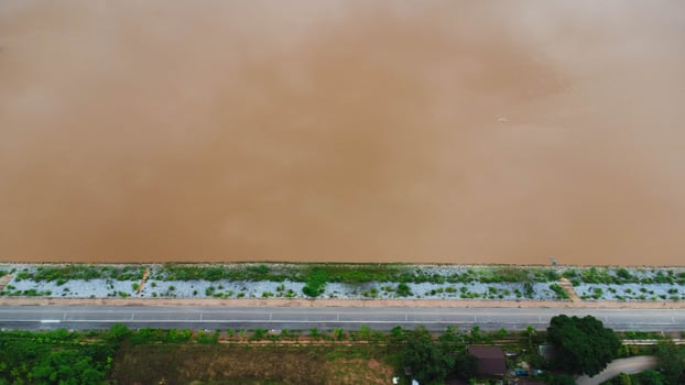 Aerial view of beautiful view of the mighty Mekong River with fishing boats passing by at the border of Thailand and Laos, Chiang Rai Province, Thailand. photo