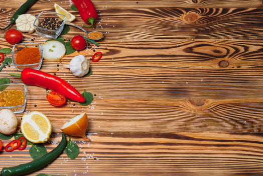 Spices and herbs over wooden background, healthy or cooking concept photo