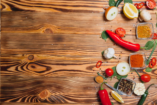 Spices and herbs over wooden background, healthy or cooking concept photo