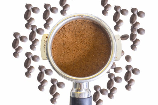 porta filter with ground coffee or coffee powder isolated from a white background photo