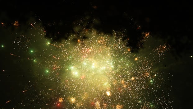 The beautiful and colorful fireworks show for new year's celebration at night photo
