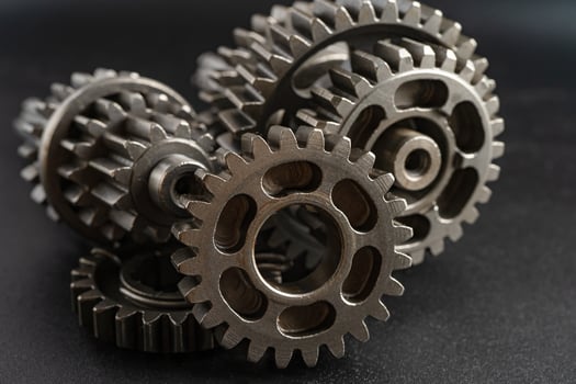 Gear and cogs wheels, clock mechanism, brass metal engine industrial. photo