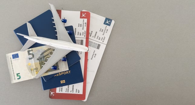 Concept Preparation for travel, money, passport, plane close-upselective focusholidays photo