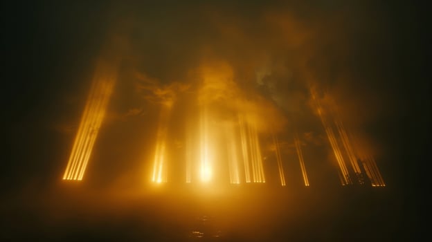 From the darkness of night the suns rays transform into towering columns of light photo