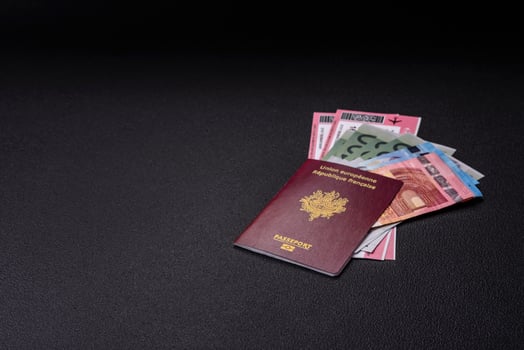 Passport of the Republic of France, airline tickets and money photo