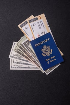 United States of America passport, airline tickets and money photo