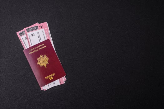 Passport of the Republic of France, airline tickets and money photo