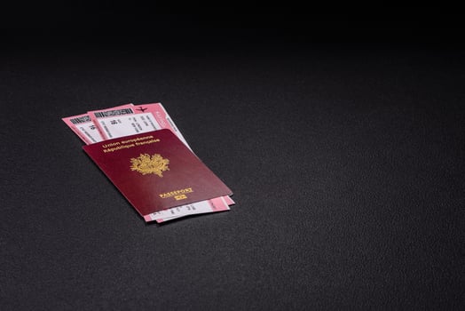 Passport of the Republic of France, airline tickets and money photo