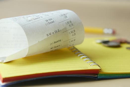 closeup of Sales receipts on table , photo