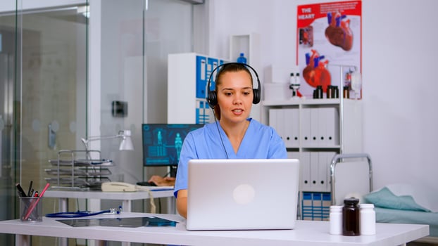 Assistant offering medical services using headphone answering calls, making appointments. hospital call center Healthcare physician in medicine clinic, receptionist doctor nurse helping with concultation photo