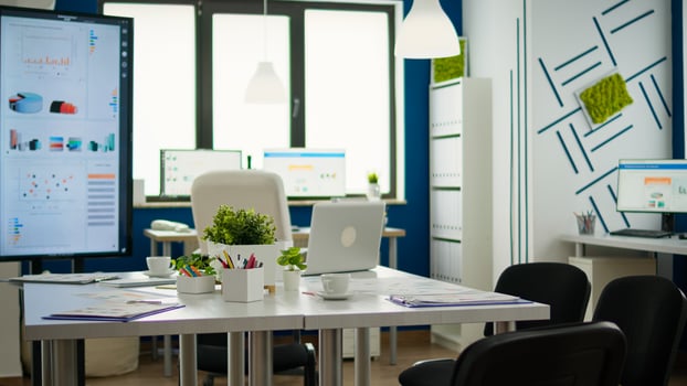 Empty start up business office, cozy light company room with conference table ready for brainstorming, modern design for meeting room. Financial company with nobody in it, workplace indoors concept. photo