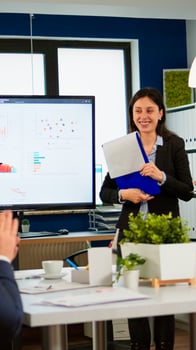 Business audience applauding woman leader manager thank for conference seminar, digital chart presentation show gratitude, multiethnic office people group clap hands praise training speaker concept photo