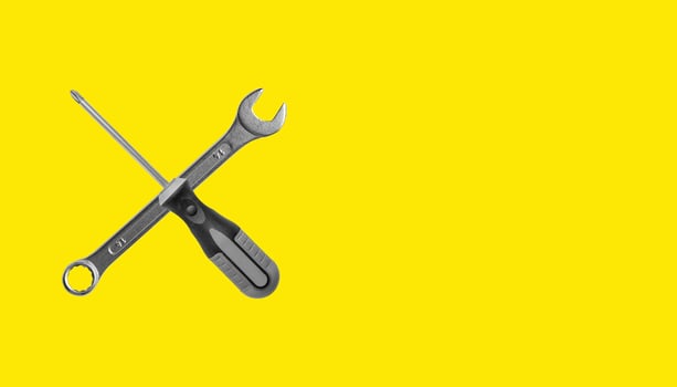 Mechanical repair tools including spanners and screwdrivers. Industrial metallic instruments for photo