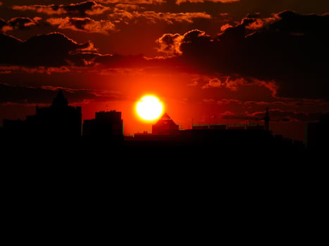 Autumn red sunset with a purple sky photo