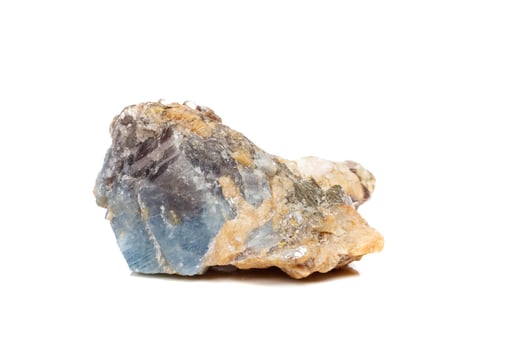Macro mineral stone Corundum in rock a white background photo