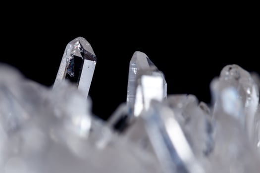 Macro Mineral Stone Rhinestone in Crystals on a Black Background photo