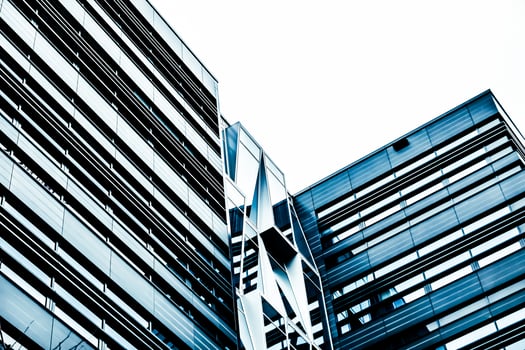 Contemporary office building in financial district, modern urban architecture photo