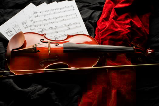Violin on a black and red background photo