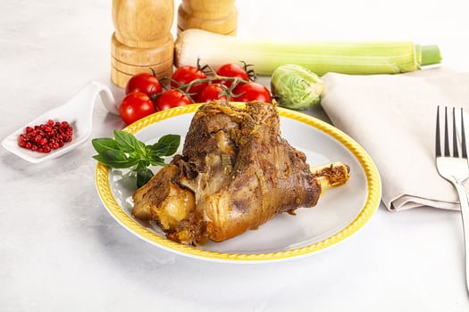 Baked Lamb shank with bone photo