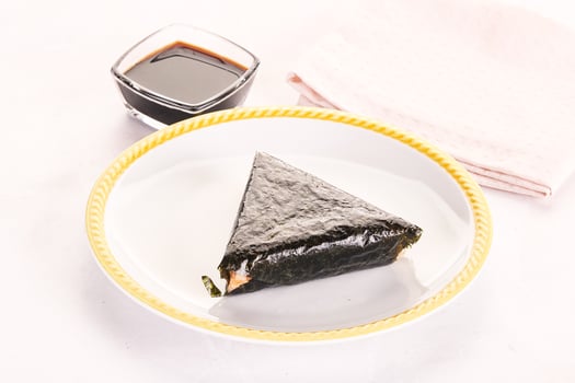 Japanese traditional onigiri with fish photo