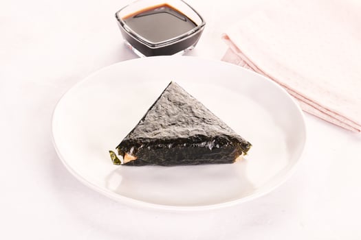 Japanese traditional onigiri with fish photo