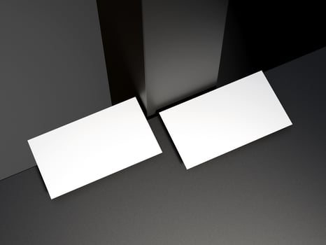 Business card on elegant metallic black background photo