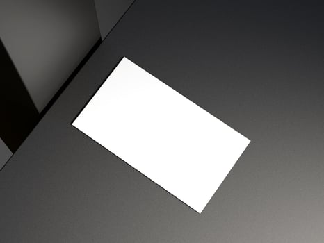 Business card on elegant metallic black background photo