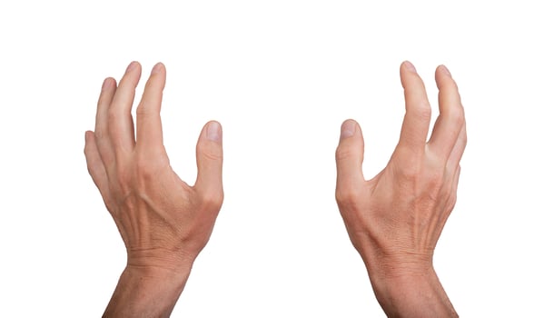 Two hands grasping, isolated on white background. Gesture indicating grabbing or catching something, photo