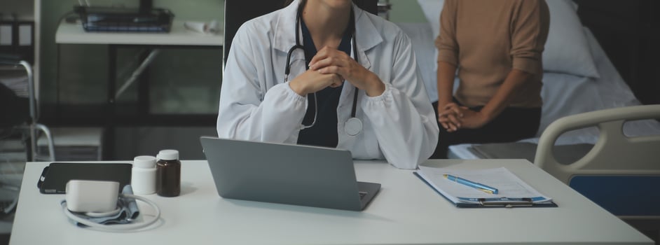 Female doctor explaining to patient results of model the process of patients. Diagnosis of diseases for Model Internal organ. photo