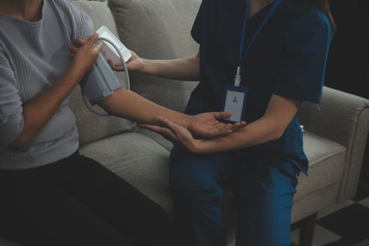 Doctor doing professional pressure examine her young patient photo