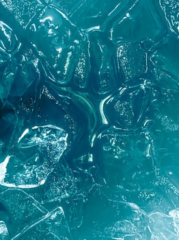 icecubes background,icecubes texture,icecubes wallpaper,ice helps to feel refreshed and cool water from the icecubes helps the water refresh your life and feel good.ice drinks for refreshment business photo