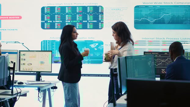 Managers collecting important statistics numbers on a big screen, reviewing sales and understanding the enterprise situation. Analyzing efficiency and workflow in goals achievement. Camera A. photo