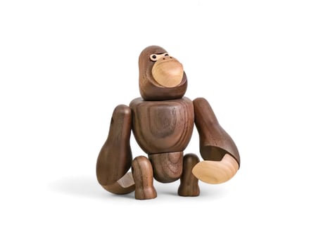Decorated miniature gorilla on a white background photo