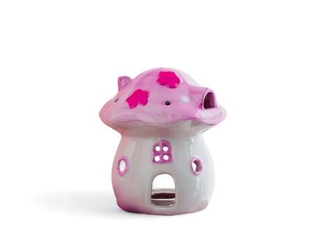 pink mushroom house decoration on a white background photo