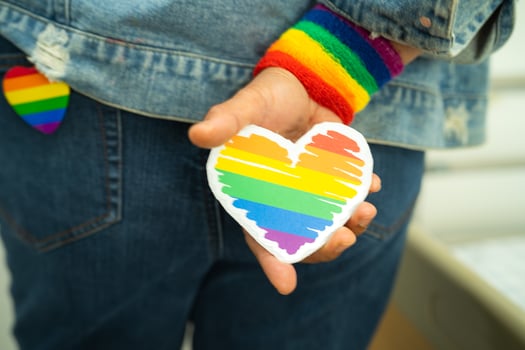 LGBT rainbow colorful flag heart and ribbon, symbol of lesbian, gay, bisexual, transgender, human rights, tolerance and peace. photo