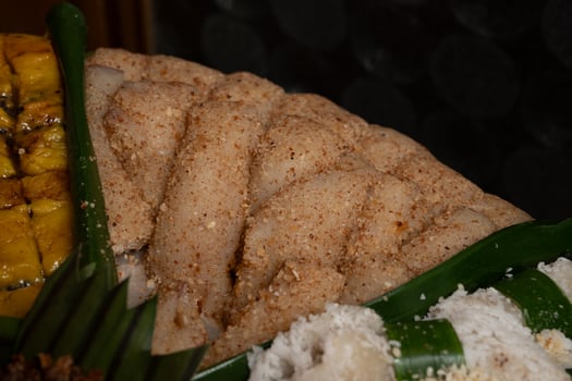 a plate of glutinous rice and coconut photo