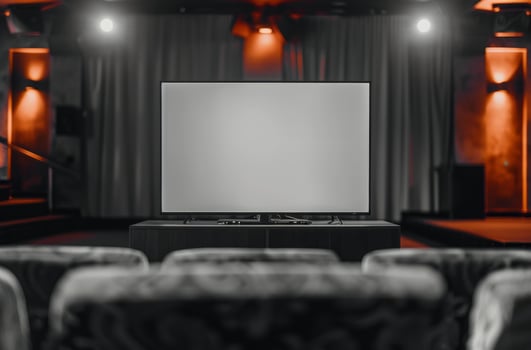 Modern Flat Screen Television in Cozy Living Room With Warm Lighting photo