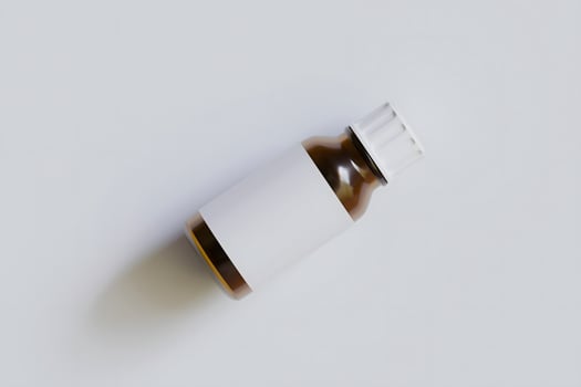 Packaging bottle brown color and white blank label for medicine, pill or supplement, cosmetic, chemical and etc on white background photo